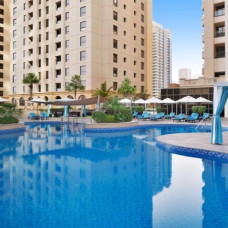 Moevenpick Hotel Jumeirah Beach Дубай Екстер'єр фото The swimming pool at the hotel